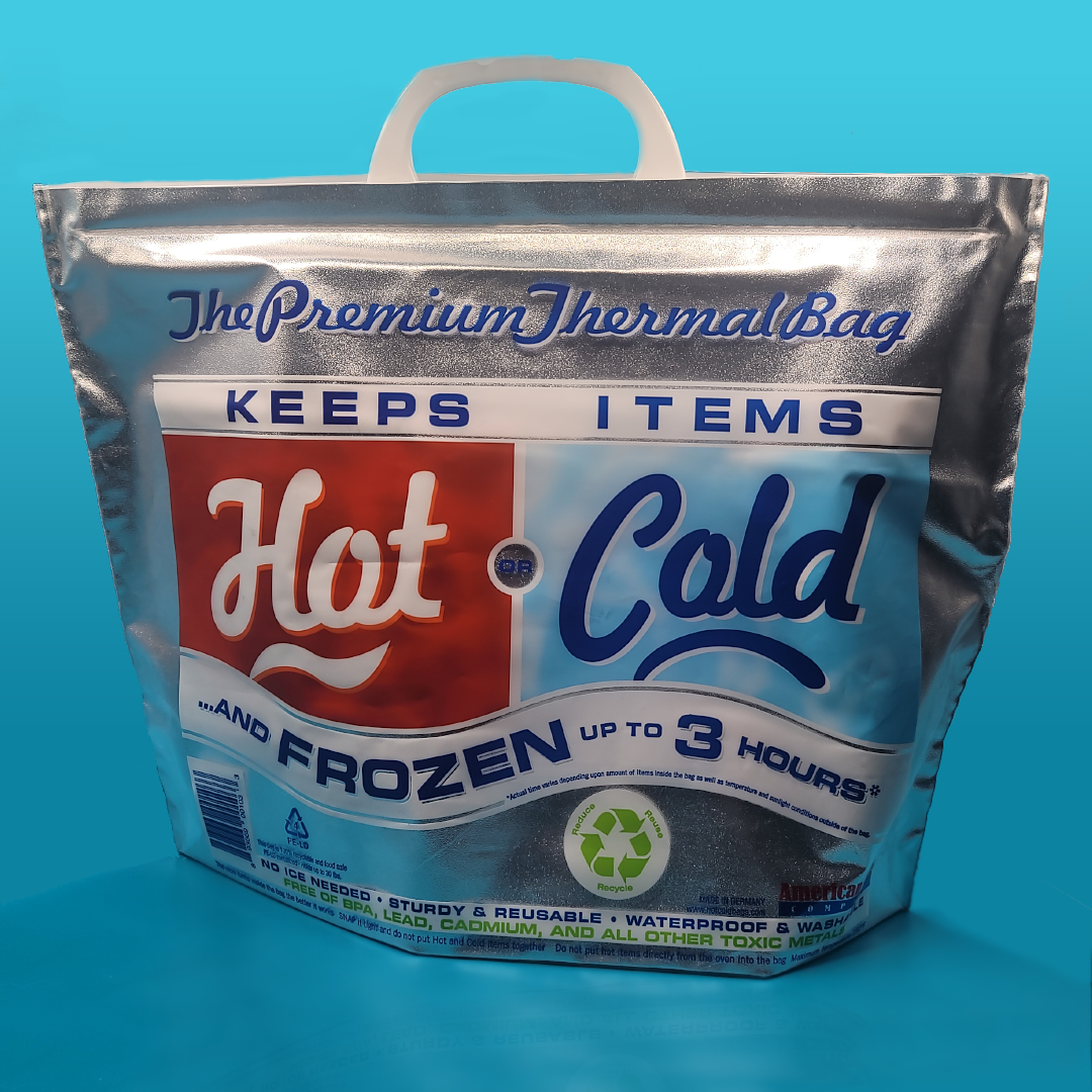 a silver-colored reusable cold thermal bag against a aquamarine background